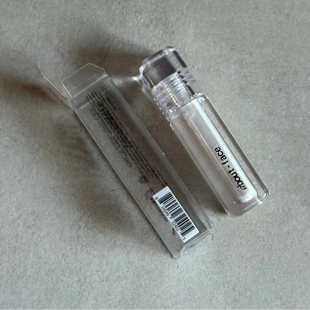 About-Face Light Lock Highlight Fluid – Prelude Pearl Glow Highlighter